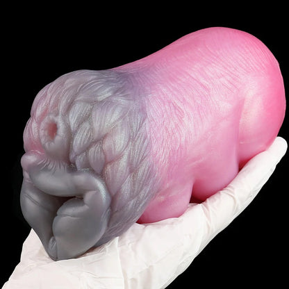 Wolf Beauty Pocket Pussy Male Masturbator - Fantasy Silicone in a hand showing detailed texture and colors