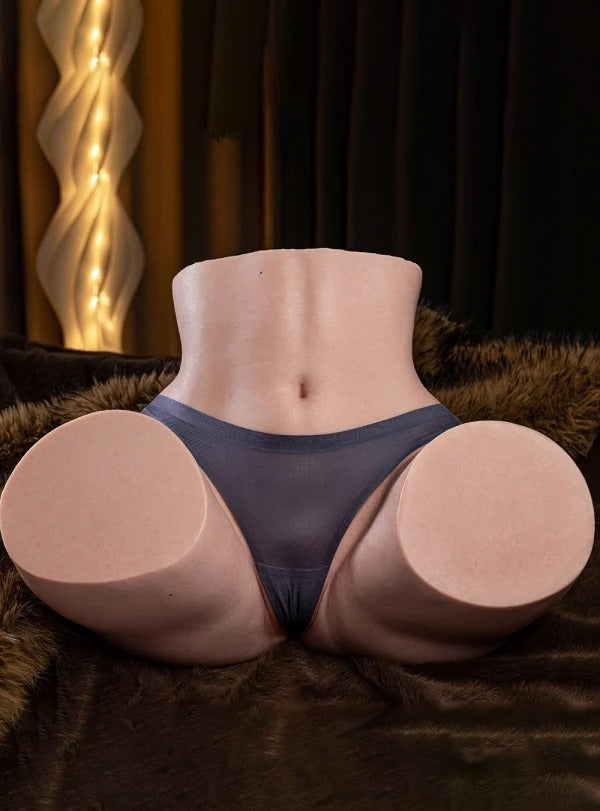 Realistic silicone sex doll butt displayed in lingerie on a plush surface for adult enthusiasts