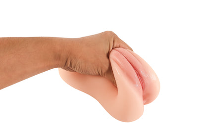 RealVagina Warm557 Realistic Vagina Masturbator Pocket Pussy being squeezed for a lifelike sensation